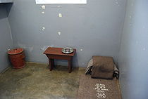 210px-Nelson_Mandela's_prison_cell,_Robben_Island,_South_Africa